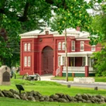 Historic red brick building with Civil War cannon in Abingdon VA — one of the best things to do in Abingdon VA